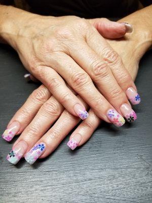 Spring french manicure. Sculptured acrylic with embedded flowers.