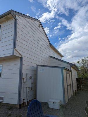 Painted the shed to match the house and look at those cut lines!