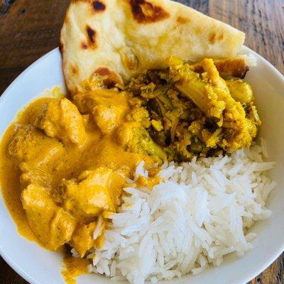 Butter chicken & Aloo Gobi. The chicken was very tender and nicely spiced. I would order this again :)