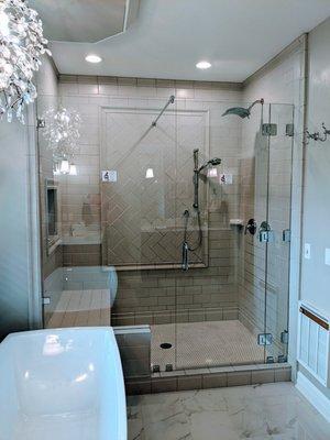 Beautiful Custom Showers built to fit. Tile pros available upon request from our Network of Trusted Professionals. 
www.MalibuGlassMI.com