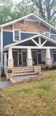 Demo old Steps and Replaced with beautiful Brick Steps with a landing and two columns.