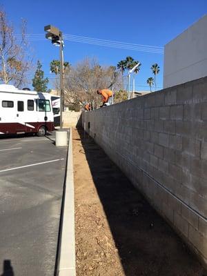 Installing razor wire fence