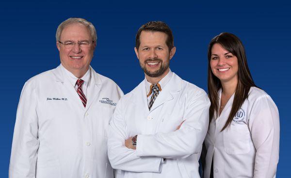 Group photo of Dr. John L Millns, Dr. Mark A Cappel, and Laura Millns PA-C