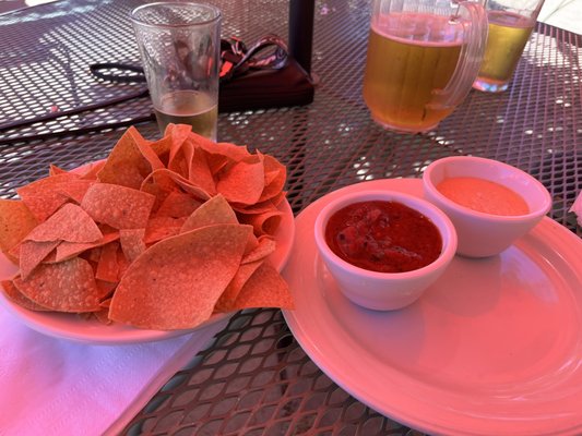 Chips, salsa and queso. Along with a pitcher of beer.