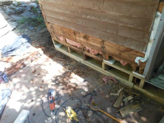 We replaced the rotted sills with pressure treated 2x4's.