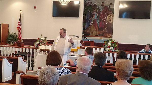 Rev. Jonathan Sherrod sharing his message during Sunday worship