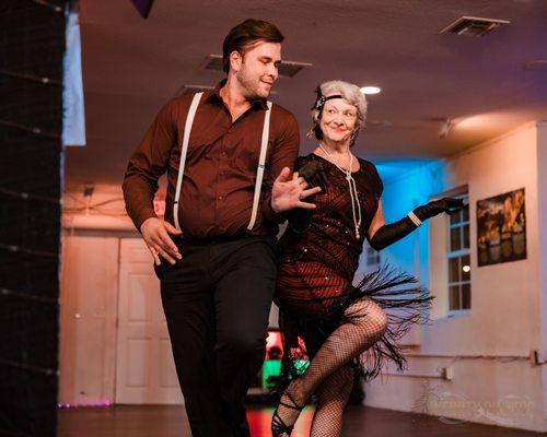 Nick Watkins and Janie Tank dancing a West Coast Swing routine.