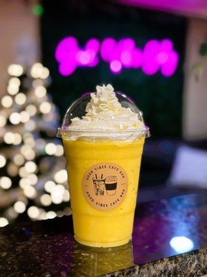 Real fruit mango smoothie with whipped cream!