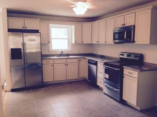 new floor, cabinets, granite, appliances and we moved an entry door into another room.