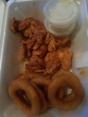 MY ONION RINGS AND BUFFALO CHICKEN WITH BLUE CHEESE DRESSING. WOULD HAVE BEEN MORE BUT ATE ALOT OF IT! LOL