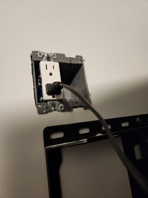 He installed the outlet, but failed to bring a faceplate that fit