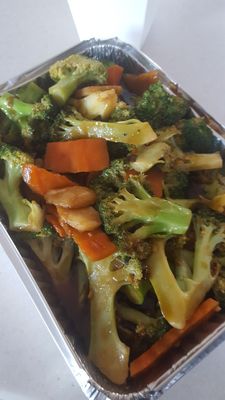 Broccoli and carrots with brown sauce.