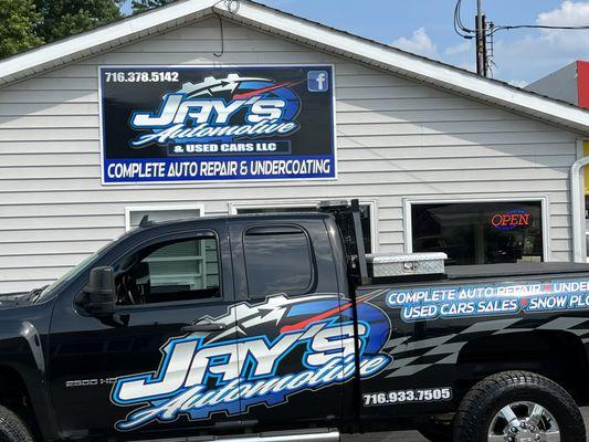 This photo is of my Shop truck and business sign on my shop wall