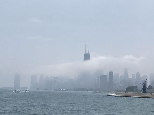 The City hiding behind a mysterious cloud.