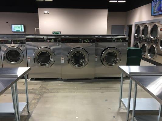 The power trio:  That's a 100 lb. machine in the middle, with (2) 80 lb. machines on either side!  As much washing as 26 top loaders!