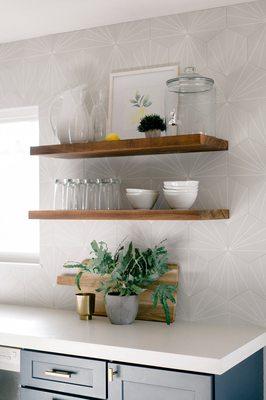 Open shelving in kitchen, functional yet stylish.