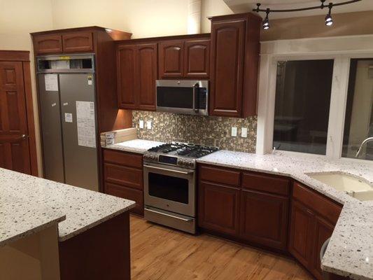 Stained Alder kitchen with custom lighting