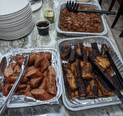 They were able to put together these trays on an hours notice.  Chopped brisket, pork belly (our favorite), and sausage links