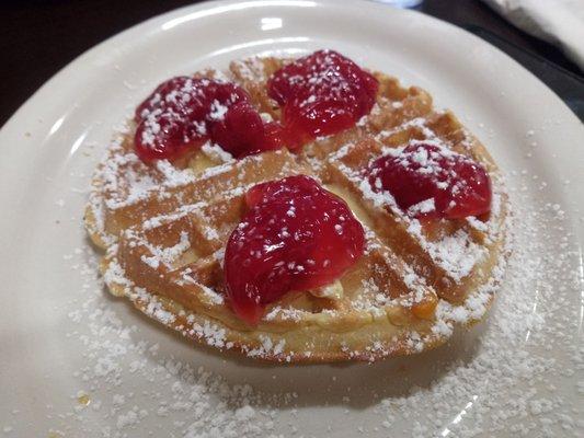 Belgian waffle with strawberry topping