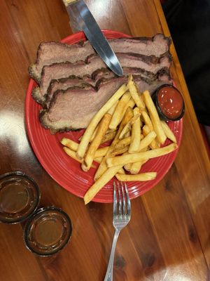 Sliced brisket with fries