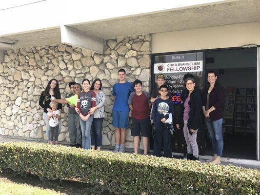 Home schoolers and their families are volunteering in the CEF office.