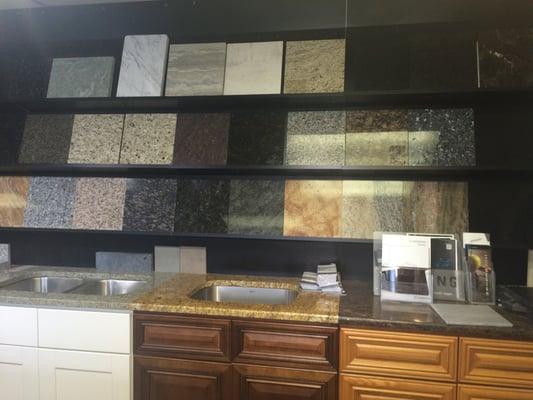 This picture is only a tiny snippet of what the showroom has to offer.  Visit to find brochures, granite and quartz samples, sinks, etc