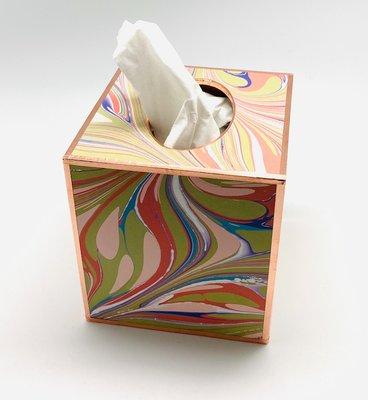 Hand marbled paper tissue boxes trimmed in copper piping.