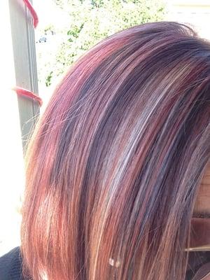 My hair after 2nd step process of blonde highlights with red and brown put in the mix