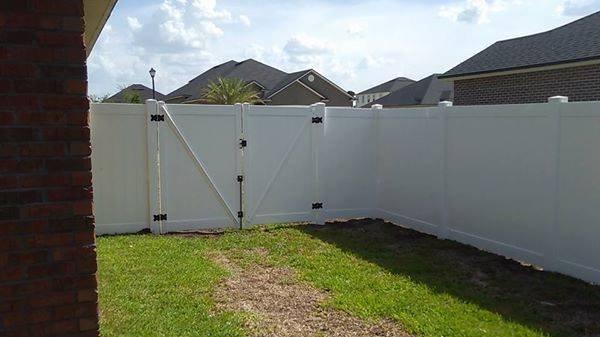 Vinyl Fence with Double Drive Gate.