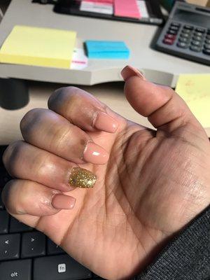 The gold nail is completely bent and the nail polish is everywhere and he didn't even bother to clean up.