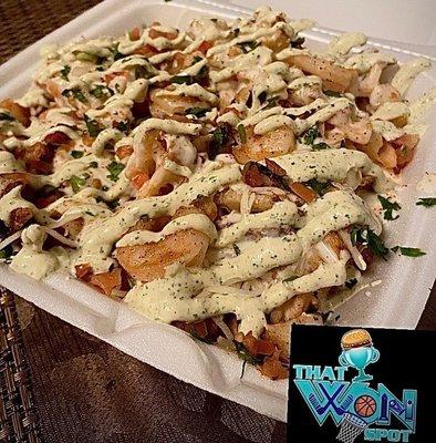 The Rival fries- Shrimp w/ Crab , cilantro aioli and Garlic Parmesan cheese