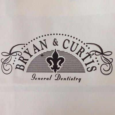 Rebecca Bryan, DDS & John Curtis, DDS - Bentonville Dental Logo