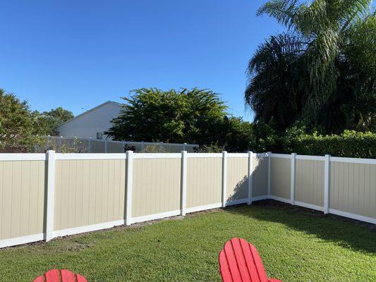 back yard with new fence.