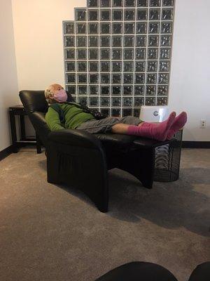 Mom just relaxing  while having her treatment.