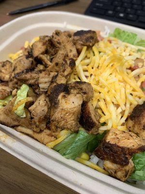 Chicken bowl, white rice, black beans, lettuce, corn, mild salsa and cheese