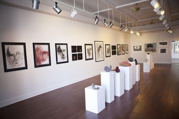 We show a mixture of local, regional and national contemporary artists in our three gallery spaces.