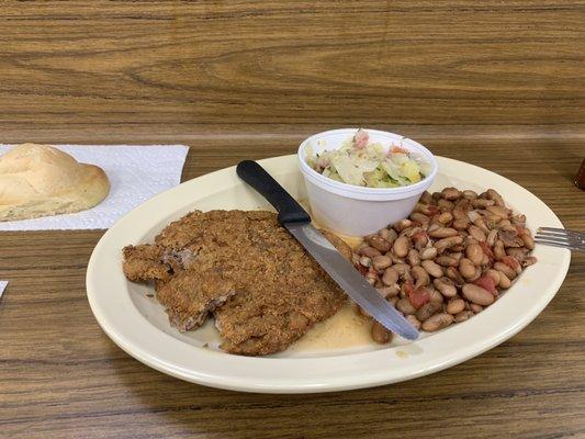 Chicken fried steak pinto beans and cabbage