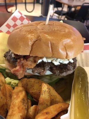 Awesome burger joint!!  Giant burgers so two adults easily could split one.  Fries are great too.  Really fresh and well out together.