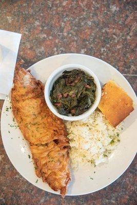 Fried fish with polowana rice , collard greens and sweet cornbread