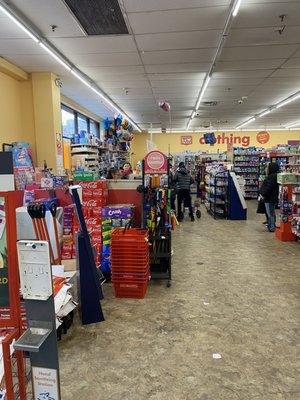 Three workers behind the register and only one person ringing people up.