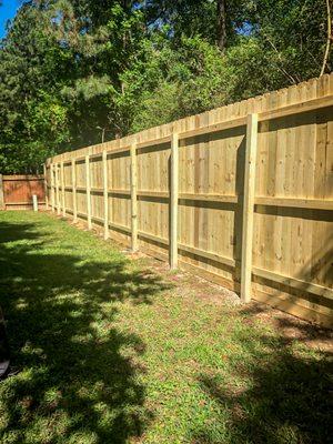 Conroe TX Fence contractors near Conroe, TX installed a privacy cedar fence with cedar posts.