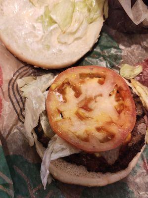 fast food restaurants need to stop serving these garbage white tomatoes. they're gross. this one went in the garbage.