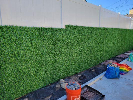 Drive way wall covered with grasstik