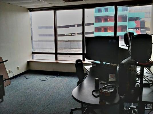 My office, complete with view of parking garage.