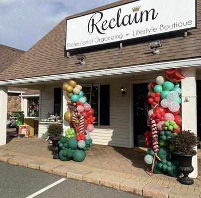 Reclaim Professional Organizing & Lifestyle Boutique store front during the week of Christmas.