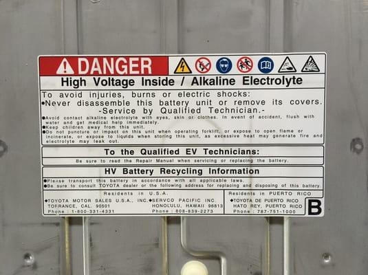 Hybrid high voltage battery warning label