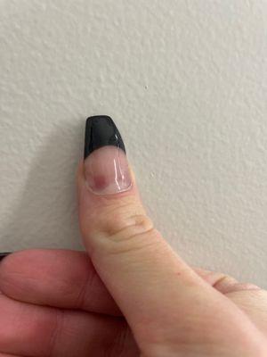 the acrylic is over my cuticle and obviously would start lifting as soon as there is growout.