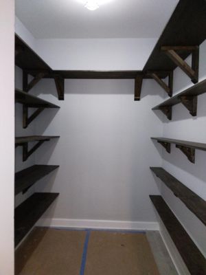 new construction home. homeowner wanted shelves to surround pantry