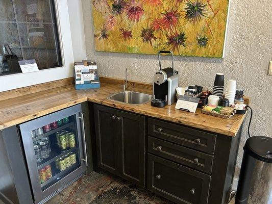 Main floor coffee station with supplied fridge