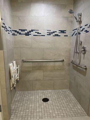 Shower inside of 1 of 3 private bathrooms